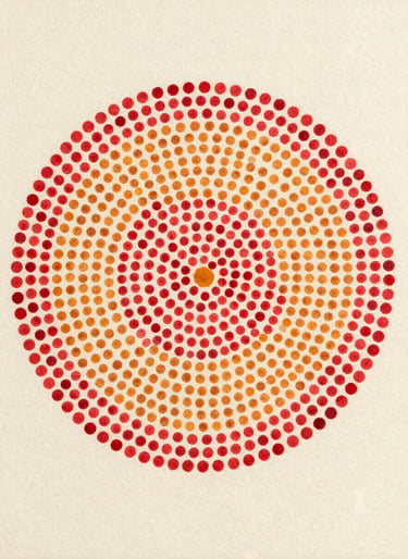 Close flatlay of a small pointillist panel, tightly packed crimson and ochre dots forming a dense circular cluster on ivory ground, diffuse north-facing studio light, edges of canvas visible