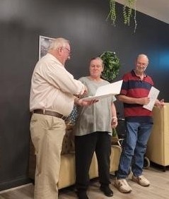 Stef & Neal Jones receive their New Member Packs from President Keith