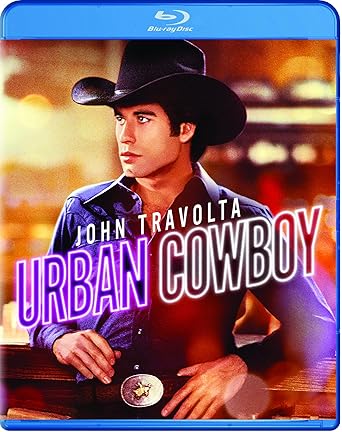 a man in a cowboy hat and a cowboy hat