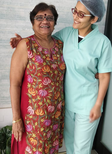 Happy dental patient after painless Dental Implants at top dental clinic near orlem malad west in mumbai