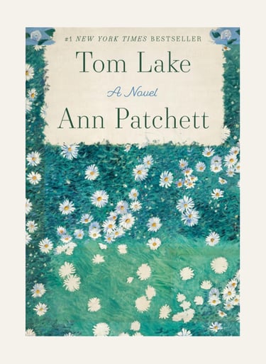 Book cover for Tom Lake by Ann Patchett featuring white daisies on a green field.