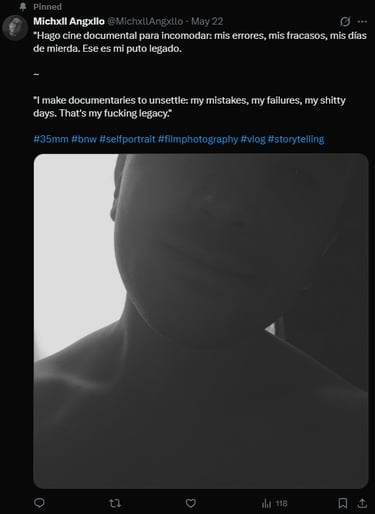 Self-portrait in black and white backlit, showing face and neck.