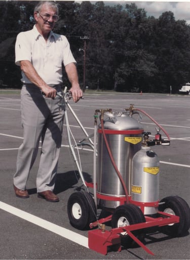 painting a parking lot using a model 350 nitrogen parking lot paint striping machine