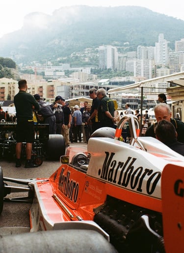an 80's Formula 1 car in the paddock at Monaco