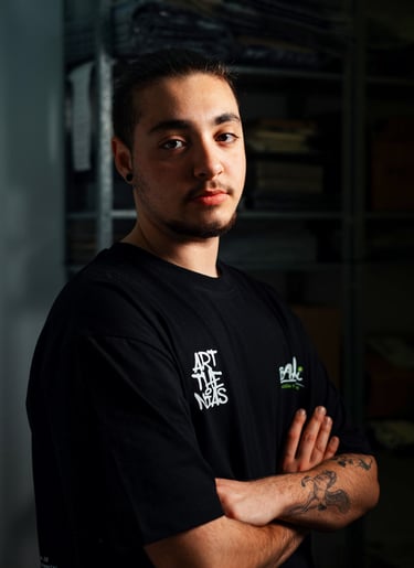 a man with a tattoo on his arm