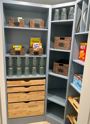 Pantry with roll out trays and mason jars 