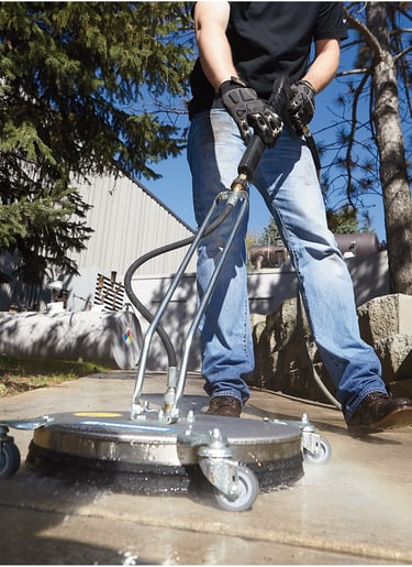 person clean with pressure washing