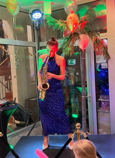 Saxiphonist warming up the new years eve crowd at the Aquapalace New Years Eve Gala Dinner, Prague, 