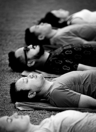 Relaxing in Savasana after outdoor yoga.