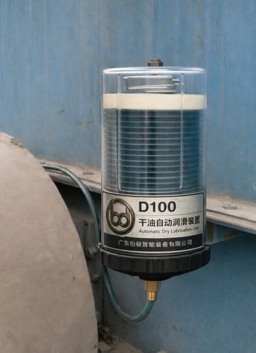Automatic lubricator mounted on industrial fan bearing for continuous lubrication