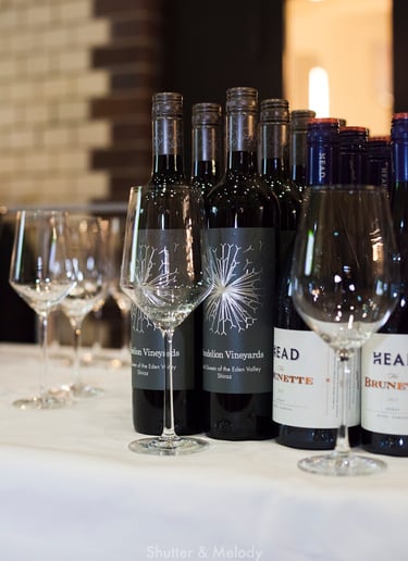 Bottles of Australian wine on a table.