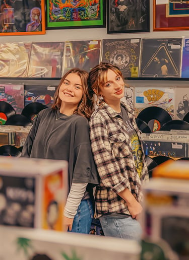 Senior pictures in a record store by Hershey PA senior picture photographer. Senior Rep Team Lancaster PA