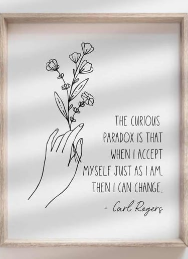 Framed quote by Carl Rogers with a hand-drawn flower: 'The curious paradox is that when I accept mys