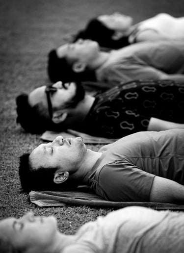 Relaxing in Savasana after outdoor yoga.