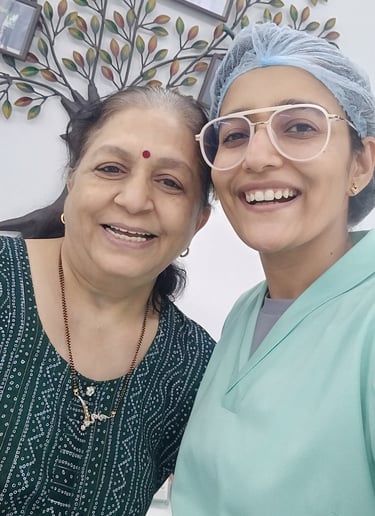Top cosmetic dentist with happy patient after teeth gap closure with teeth veneers in Goregaon west Mumbai
