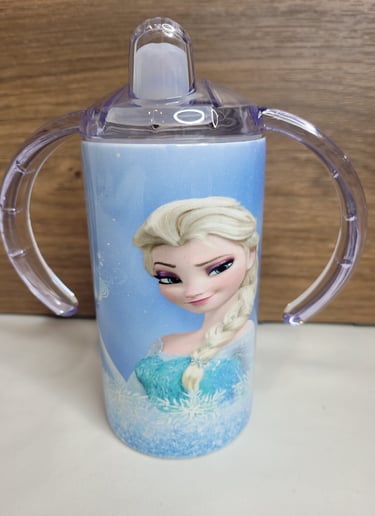a cup of frozen water with a frozen princess