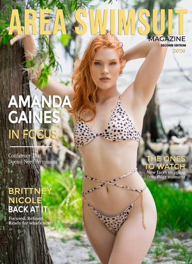 Redhead model Amanda Gaines in a spotted bikini on an Area Swimsuit magazine cover.