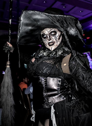 Person in goth make-up posing in a club