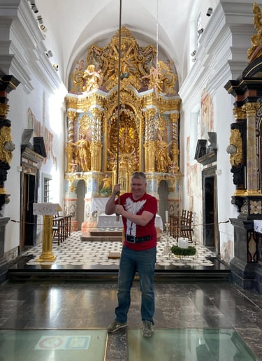 Man ringing the Wishing Bell on Bed Island