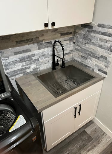 Laundry room sink, cabinet and backsplash replacement