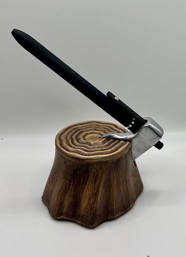 An axe-shaped pen dock