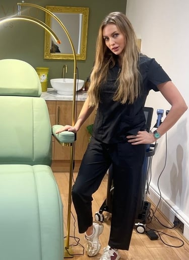 a woman standing in front of a chair