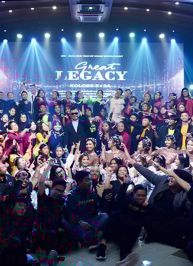 a group of people standing around a stage