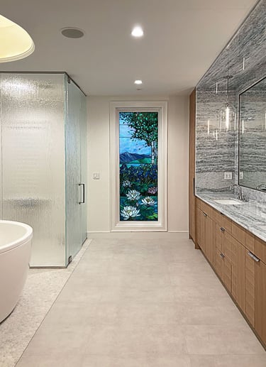 Renovated primary bath, freestanding tub, rain glass shower, stained glass window, Erica Fossati Lexington