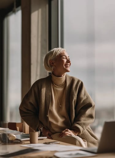Female entrepreneur working on laptop in modern home office, building her online business with Syste
