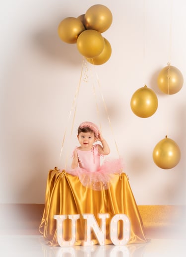 a baby girl in a pink tutututututututututu