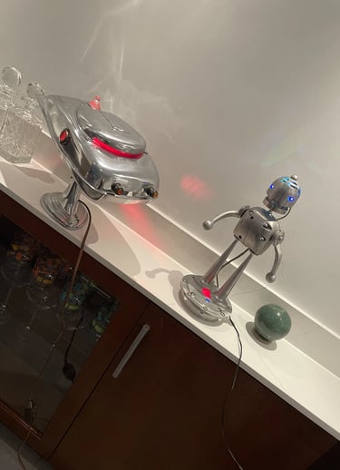 Talbotics robot and spaceship lit up in Miami home.