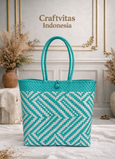 Eco friendly handwoven plastic tote bag with Indonesian batik chevron pattern in teal and white