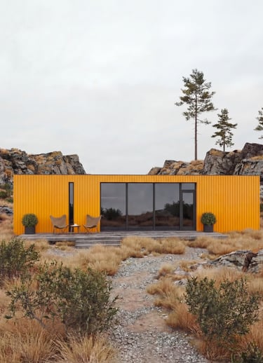 Contemporary cabin exterior design with large glass windows