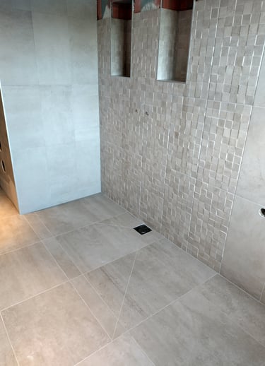 Tegelvloer met afschot