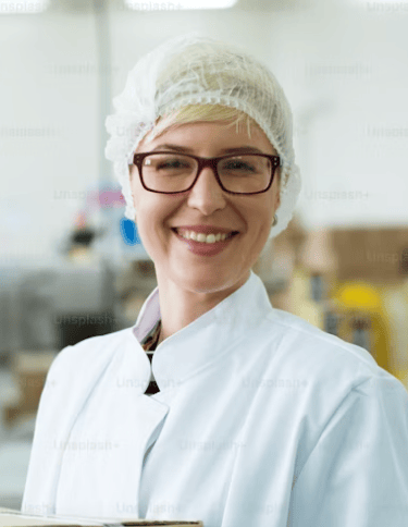 Warehouse employee smiling