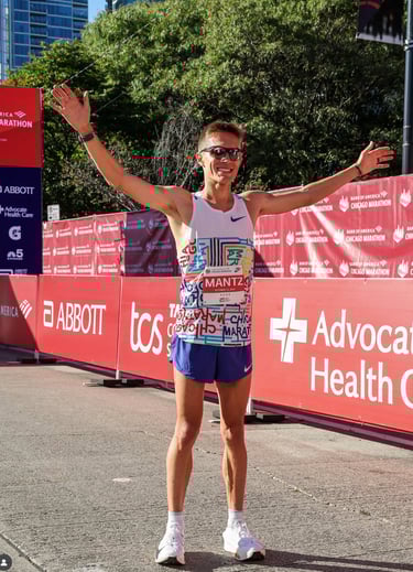 Conner Mantz after the Chicago Marathon, setting the American Record of 2:04:43.