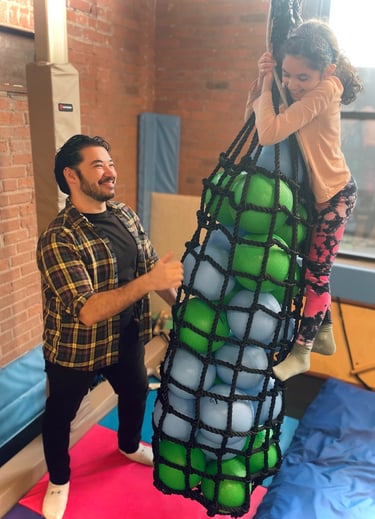 BCT Owner Constantinos Kokkinos providing a mindful movement break in office at PlayWell Brooklyn