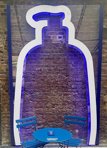 Cetaphil neon sign in bottle shape at Covent Garden event.