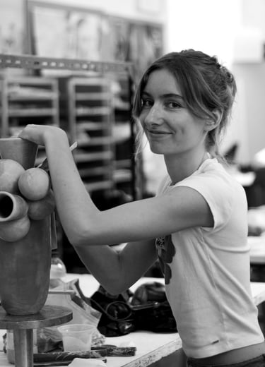 Irene de Vilder with one of her vases.