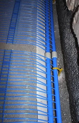 Mat distributor pipes are placed in slots