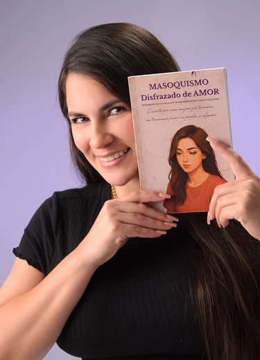 Smiling woman holding her book Masoquismo Disfrazado de Amor against a purple background.