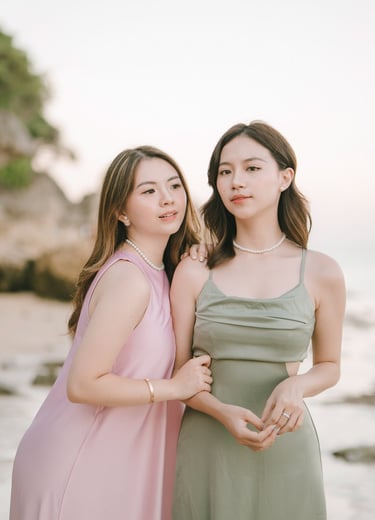 Portrait of two friends standing together during photoshoot at Geger Beach Nusa Dua Bali