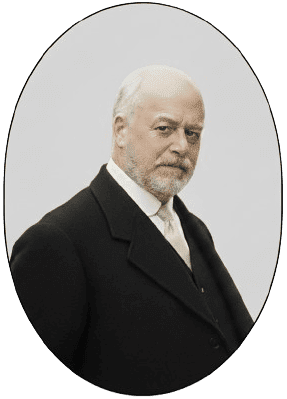 Retrato de Domènec Balet Nadal (Domingo Balet) con traje negro, camisa blanca y corbata.