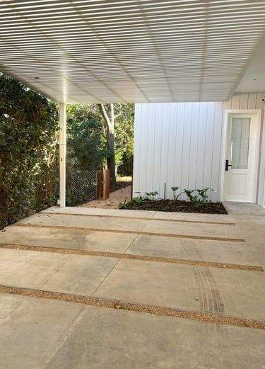 a patio with a white roof and a white roof