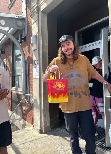 Man holding a gift bag