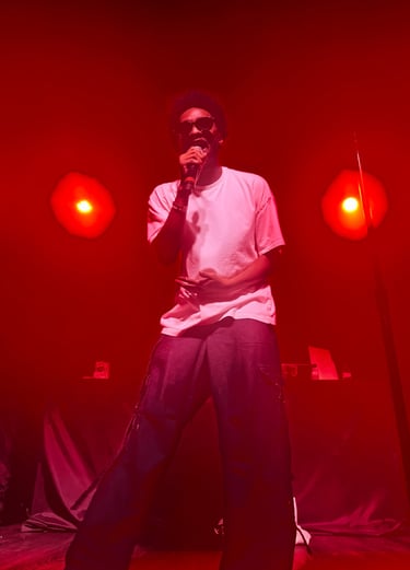 man rapping on stage 