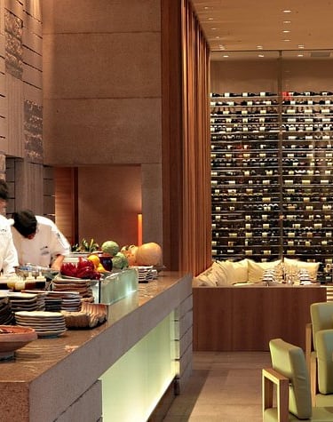 a restaurant with chefs and chefs in the background