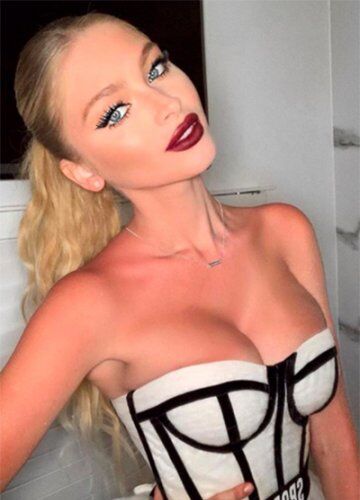 A Beautiful Russian woman Escort with a very big breast breasty and a very big breasty