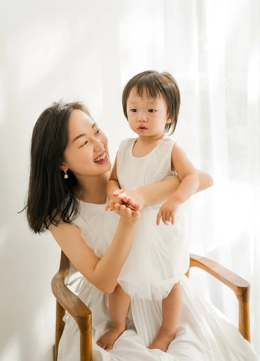Mother and baby portrait during Stefy family session at Renaissance Uluwatu Bali