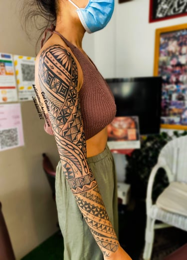 carl cocker polynesian tattoo artist brisbane sydney perth melbourne australia woman sleeve tattoo